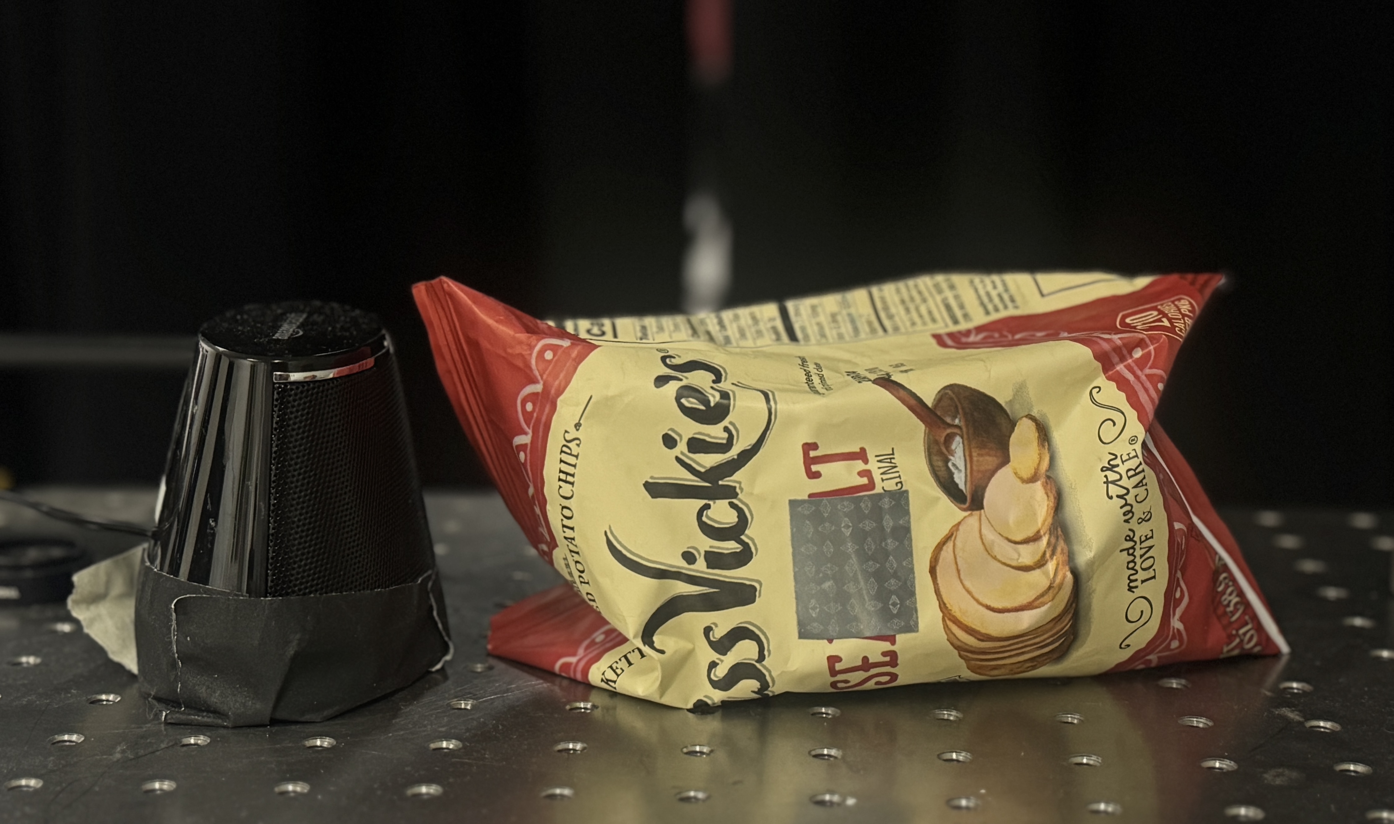 Experimental setup with chip bag for indirect audio from surface vibrations